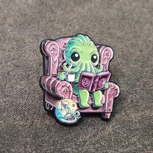 Cthulhu Reading In A Purple Chair Pin